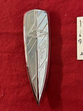 1941-42 CHEVROLET LOWER GRILLE TRUCK EMBLEM?
