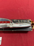 1952 CHEVROLET NOS STYLELINE TRUNK EMBLEM FOR POWER GLIDE