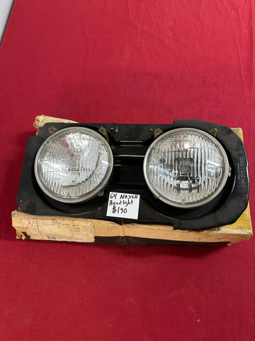 1964 CHEVROLET NOS LEFT HEADLIGHT