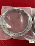 1955 CHEVROLET NOS HEADLIGHT RINGS