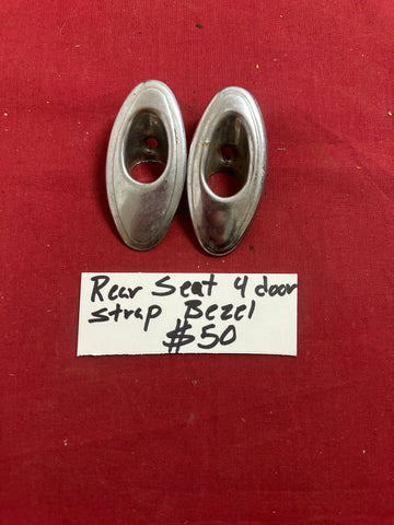 REAR SEAT FOUR DOOR STRAP BEZEL