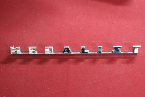 1958 FORD MERCURY NEW OLD STOCK MEDALIST EMBLEM