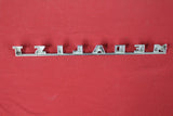 1958 FORD MERCURY NEW OLD STOCK MEDALIST EMBLEM