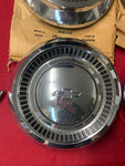 1964 CHEVROLET NOS PASS HUBCAPS. ALL FOUR