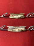 1959? CHEVROLET NOS FRONT FENDER EMBLEM