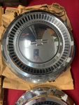 1964 CHEVROLET NOS PASS HUBCAPS. ALL FOUR