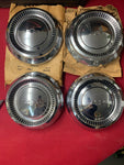 1964 CHEVROLET NOS PASS HUBCAPS. ALL FOUR
