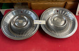 PAIR OF CADILLAC HUBCAPS