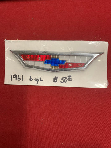 1961 CHEVROLET NOS 6 CYLINDER REAR EMBLEM